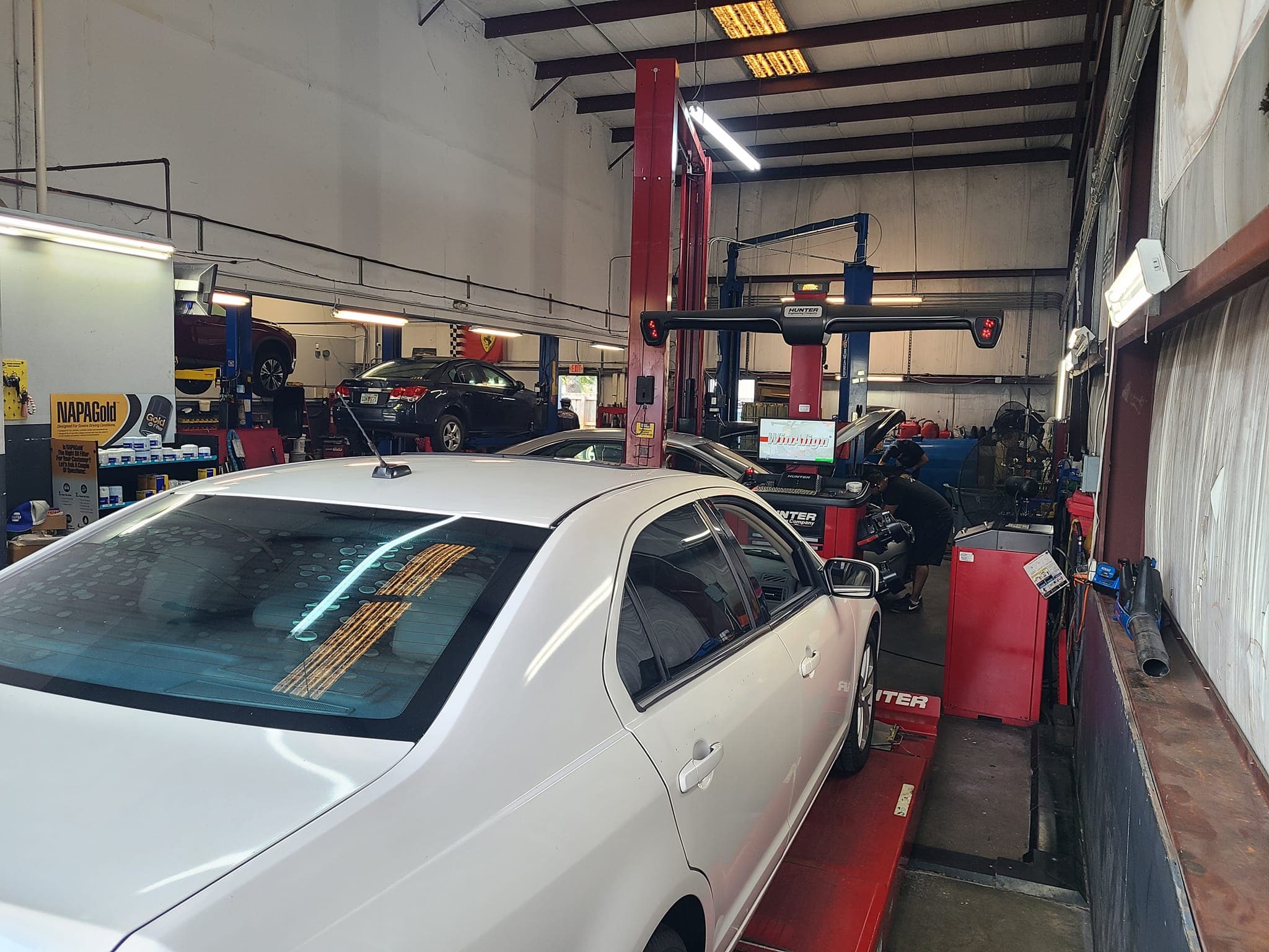 Shop Interior with Multiple Vehicles